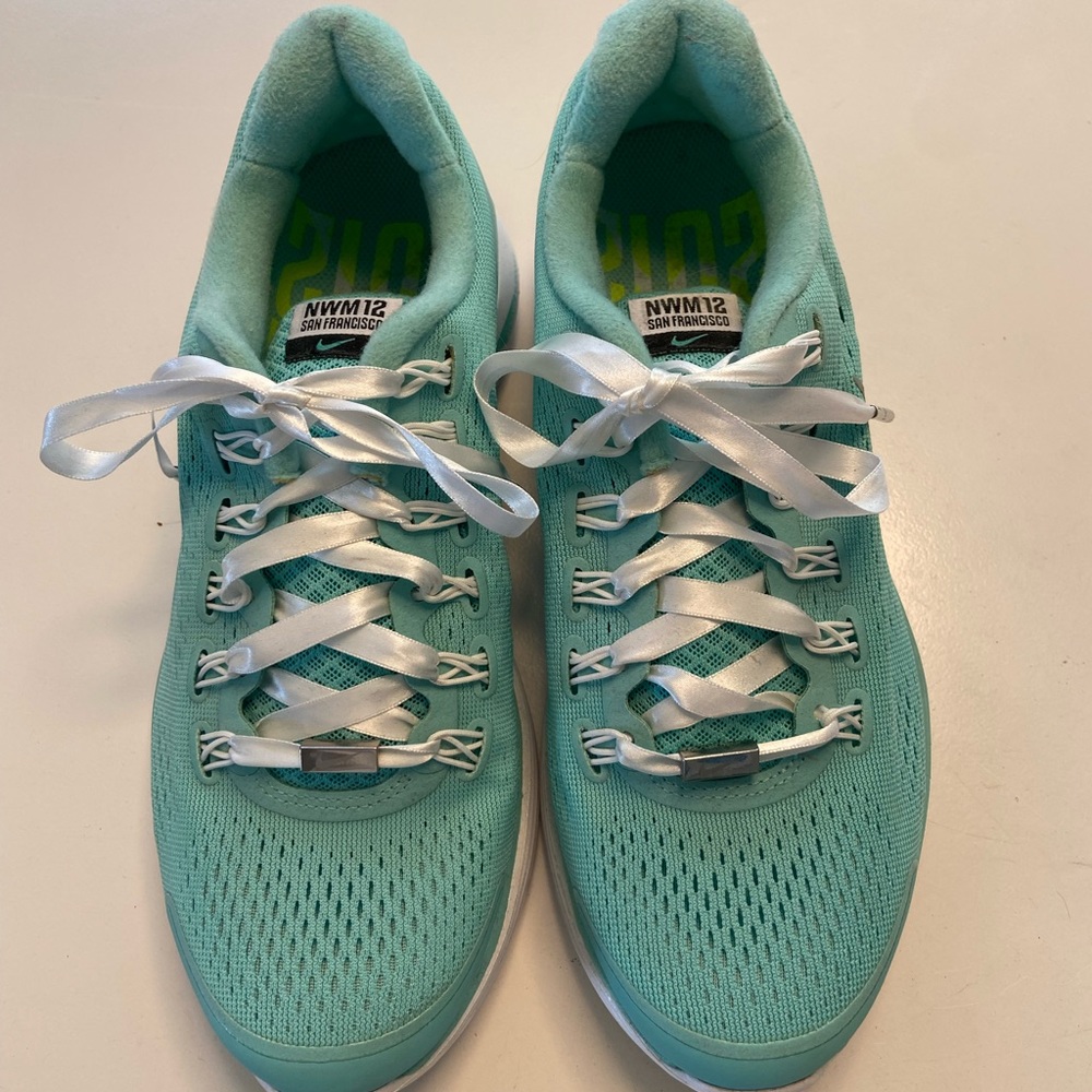 Never worn Nike womens marathon 2012 San Francisco shoes.